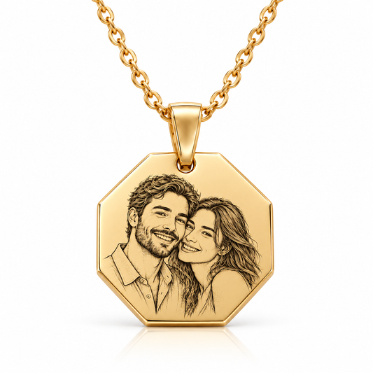 Gold octagon pendant with detailed black human portrait engraving