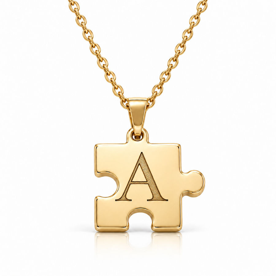 Gold puzzle necklace with black engraved letter A